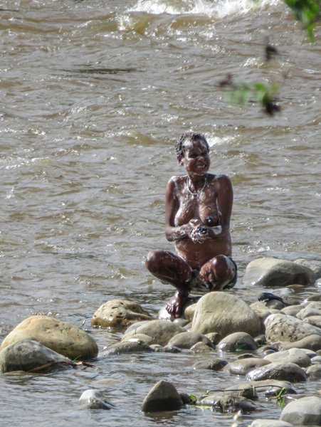 Person bathing in river